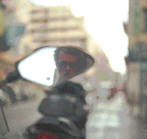 Self Portrait in Moped Mirror